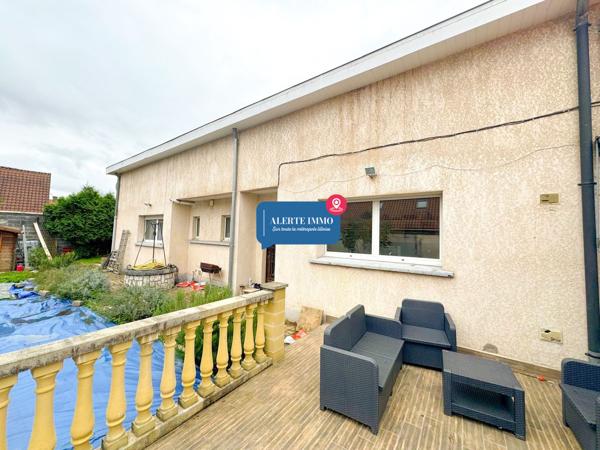 Large maison individuelle en retrait de rue de 282 m2 hab sur un terrain de 650 m2