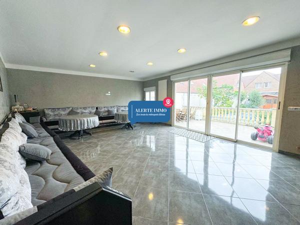 Large maison individuelle en retrait de rue de 282 m2 hab sur un terrain de 650 m2