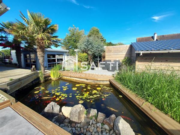 Maison plain pied + trois appartements