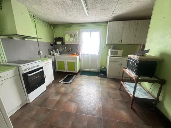 Maison de ville 3 chambres-garage-jardin