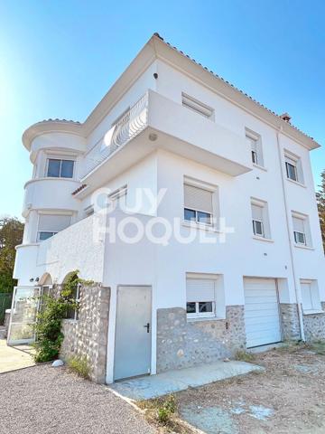 TOULOUGES immeuble 4 faces, 3 appartements, un garage + terrain encore constructible