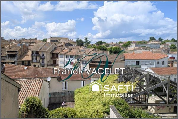 Maison avec jardin en coeur de ville