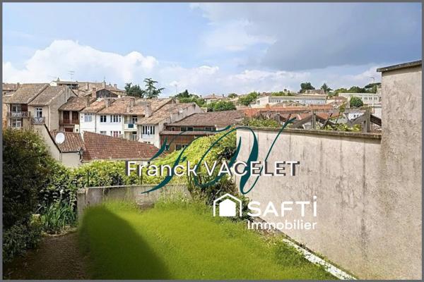 Maison avec jardin en coeur de ville