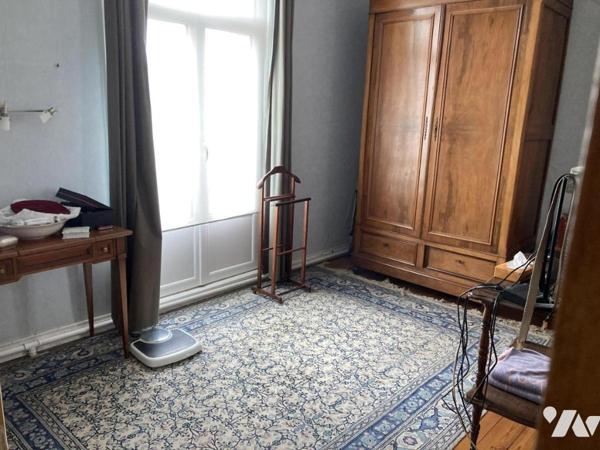 BUCQUOY - MAISON BOURGEOISE avec grange et jardin.