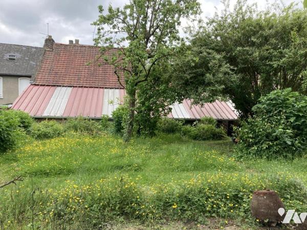 BUCQUOY - MAISON BOURGEOISE avec grange et jardin.