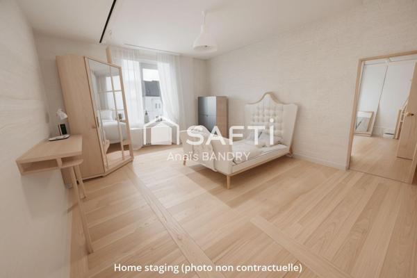 Maison dans un village avec commerces