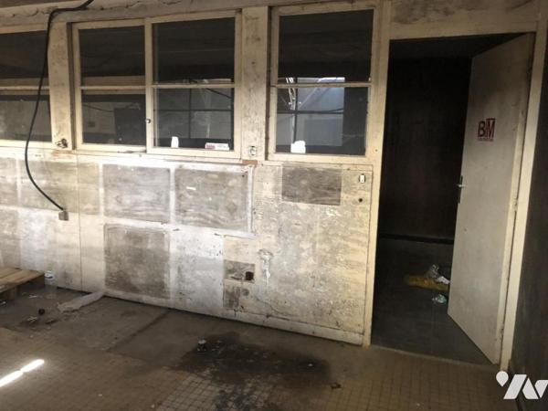 ENSEMBLE IMMOBILIER composé de deux bâtiments et un terrain constructible