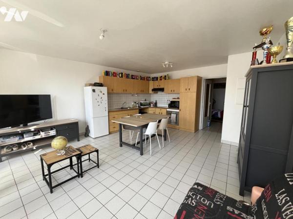 IMMEUBLE DE RAPPORT – 5 LOGEMENTS -5 GARAGES-1 PARKING– DPE C