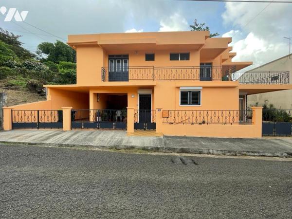 Vente d'une maison de type F7 à usage d'habitation