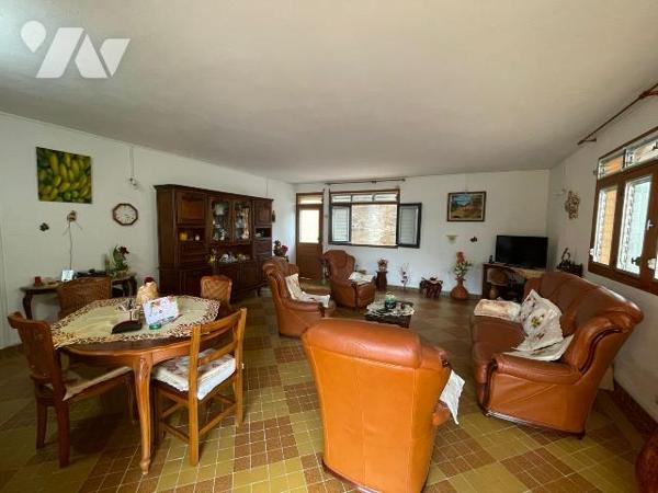 Vente d'une maison de type F7 à usage d'habitation