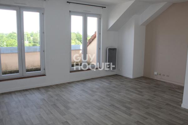 Dernier étage d'une résidence proche gare