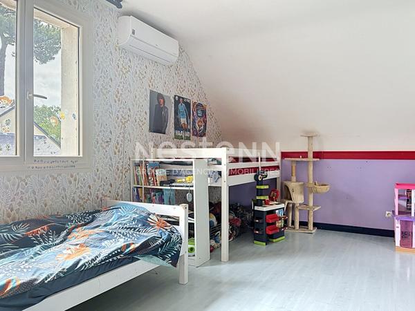 Maison familiale dans un cadre boisé à Soucelles