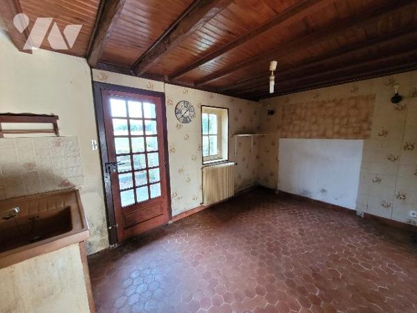 Maison ancienne garage et jardin