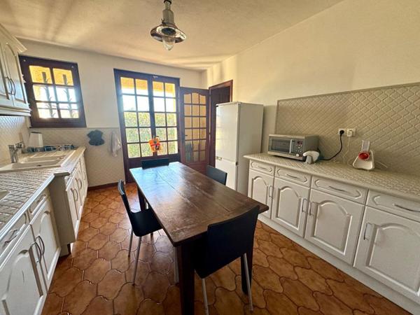 Maison 4 chambres avec piscine et garage