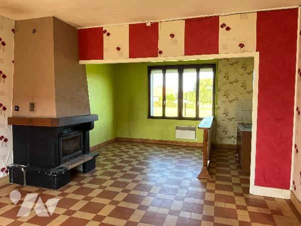 Ancien corps de ferme avec dépendances et terrain
