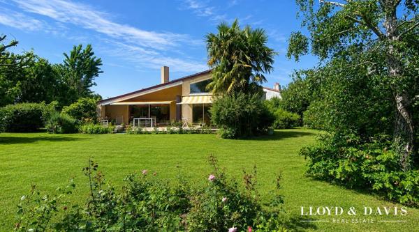 Maison familiale atypique avec DPE B, beaux volumes et jardin arboré