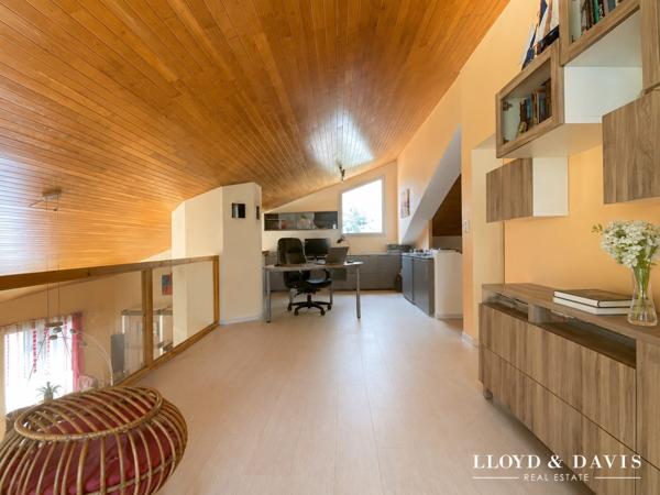 Maison familiale atypique avec DPE B, beaux volumes et jardin arboré