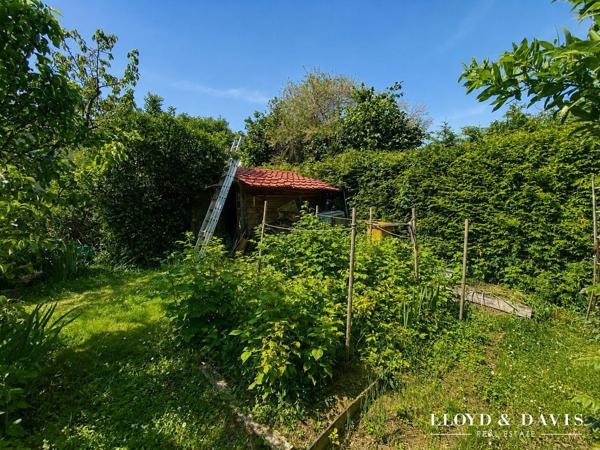 Maison familiale atypique avec DPE B, beaux volumes et jardin arboré