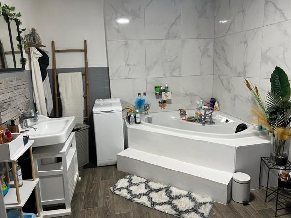 Maison de 170 m2, 4 chambres garage, terrain de 259 m2.