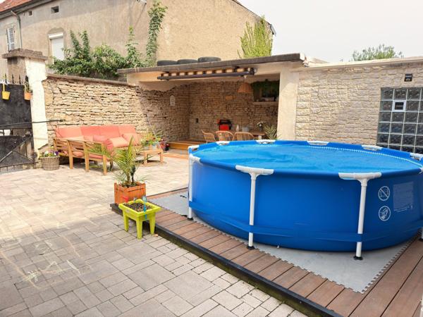 Maison de 170 m2, 4 chambres garage, terrain de 259 m2.