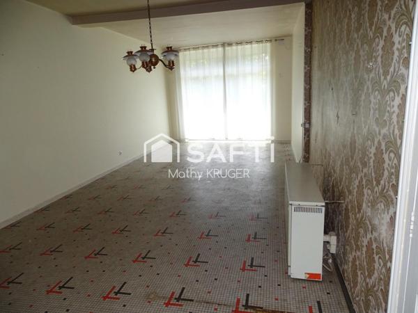 Bâtisse de caractère au cœur du village