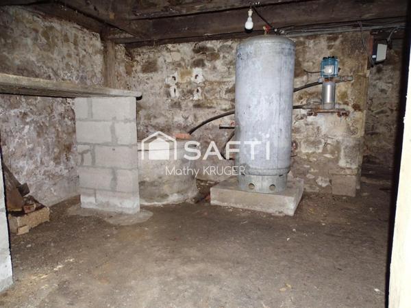 Bâtisse de caractère au cœur du village