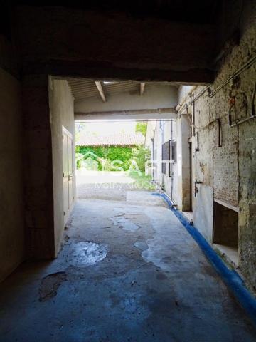 Bâtisse de caractère au cœur du village