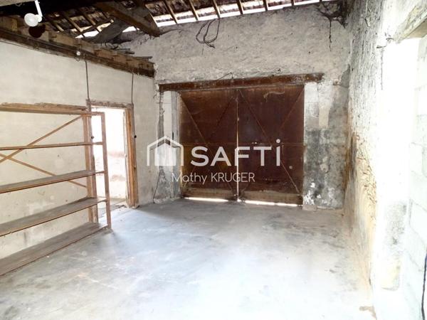 Bâtisse de caractère au cœur du village