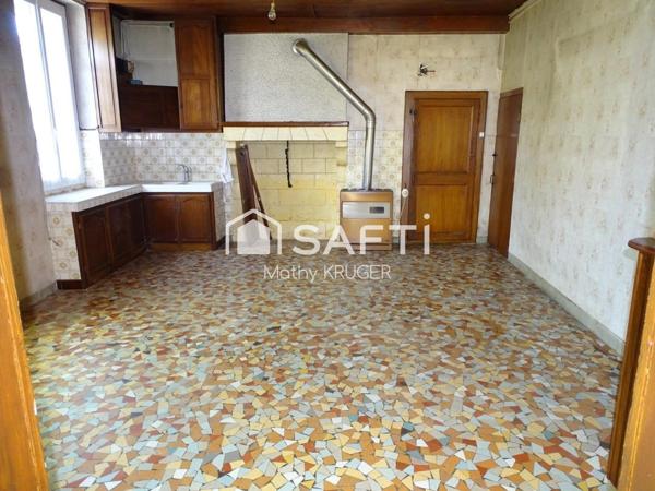 Bâtisse de caractère au cœur du village