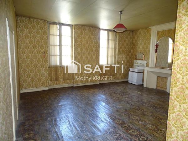 Bâtisse de caractère au cœur du village