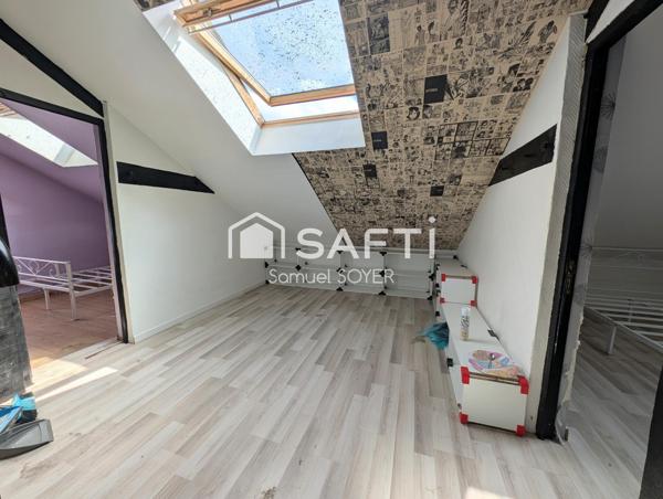 MAISON INDIVIDUELLE SUR SOUS-SOL/GARAGE ET JARDIN