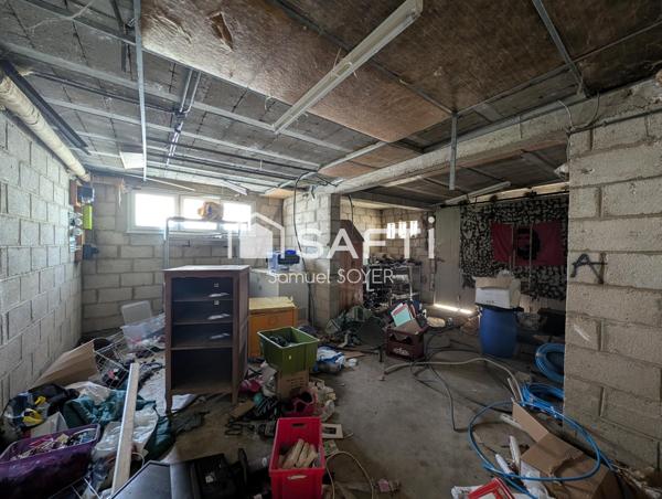 MAISON INDIVIDUELLE SUR SOUS-SOL/GARAGE ET JARDIN