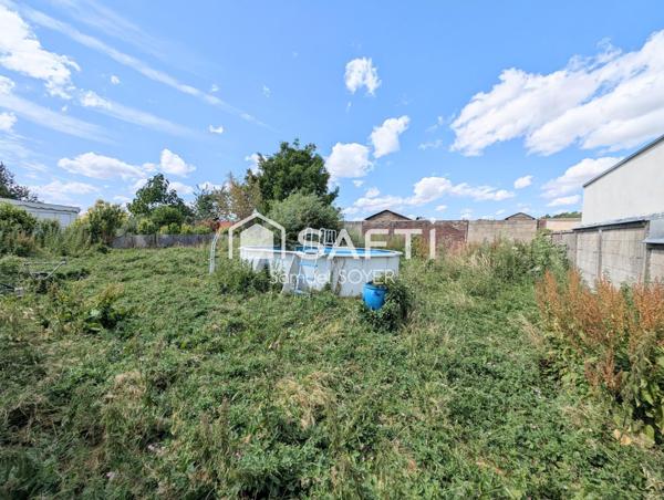 MAISON INDIVIDUELLE SUR SOUS-SOL/GARAGE ET JARDIN