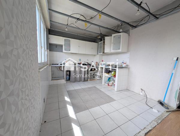 MAISON INDIVIDUELLE SUR SOUS-SOL/GARAGE ET JARDIN