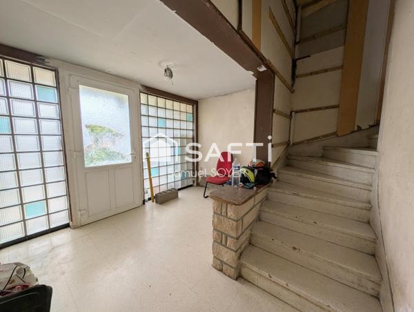 MAISON INDIVIDUELLE SUR SOUS-SOL/GARAGE ET JARDIN