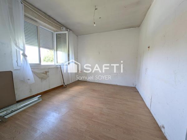 MAISON INDIVIDUELLE SUR SOUS-SOL/GARAGE ET JARDIN