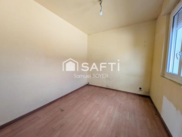 MAISON INDIVIDUELLE SUR SOUS-SOL/GARAGE ET JARDIN