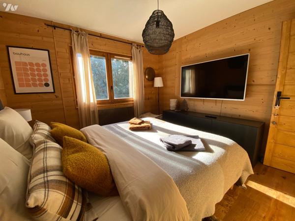 3 pièces 2 chambres lits superposés 2 salles de bains 2 WC Garage type box 2 caves 2 placards à skis