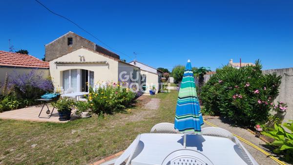 Trois maisons sur une parcelle de 1069m² ! Idéal pour les familles nombreuses