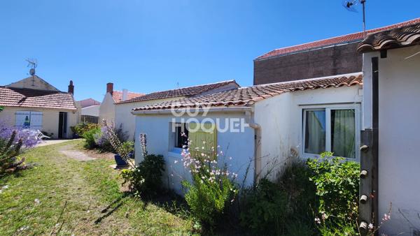 Trois maisons sur une parcelle de 1069m² ! Idéal pour les familles nombreuses