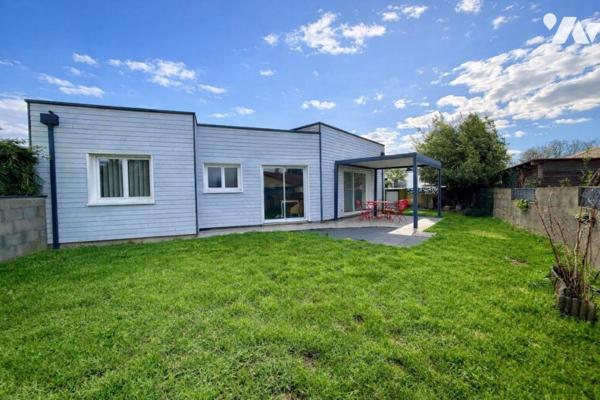 Maison de plain-pied moderne, jardin ouest, garage