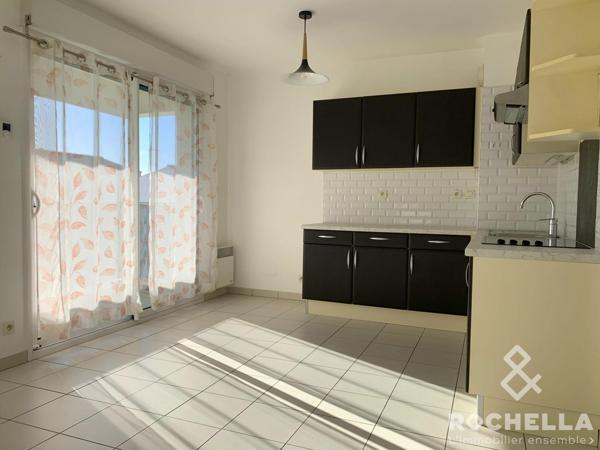 Aytré centre, appartement lumineux de 60m2, 2 chambres avec balcon et garage privatif.
