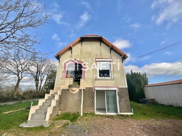 Maison des années 50 , 88m2-Charme, potentiel et authenticité à révéler