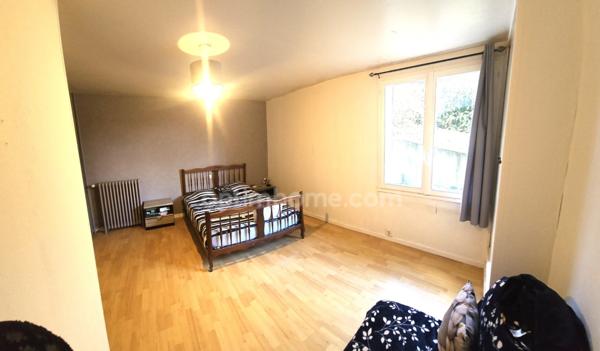 Maison à vendre 7 pièces :3 chambres, grand terrain, terrasse couverte, garage, sous-sol – Proche centre-ville !