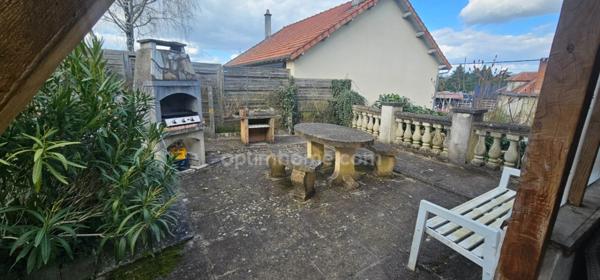 Maison à vendre 7 pièces :3 chambres, grand terrain, terrasse couverte, garage, sous-sol – Proche centre-ville !