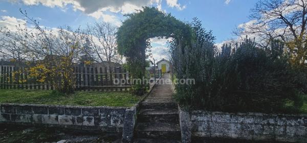 Maison à vendre 7 pièces :3 chambres, grand terrain, terrasse couverte, garage, sous-sol – Proche centre-ville !