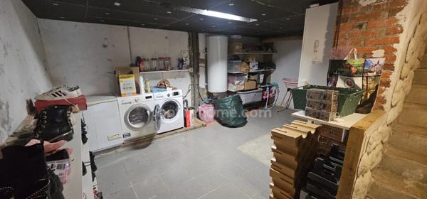 Maison à vendre 7 pièces :3 chambres, grand terrain, terrasse couverte, garage, sous-sol – Proche centre-ville !