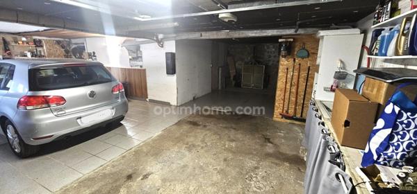 Maison à vendre 7 pièces :3 chambres, grand terrain, terrasse couverte, garage, sous-sol – Proche centre-ville !