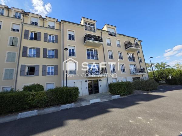 Appartement 47 m² avec Terrasse et Parking Privé