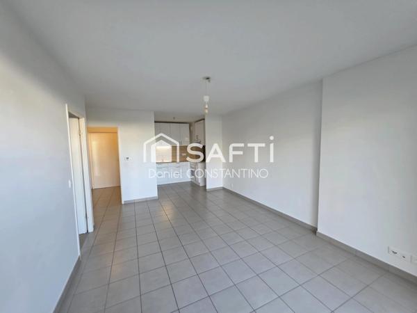 Appartement 47 m² avec Terrasse et Parking Privé